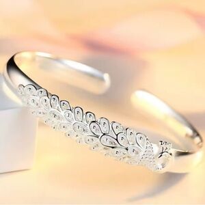 Elegant Silver Peacock Bracelet.